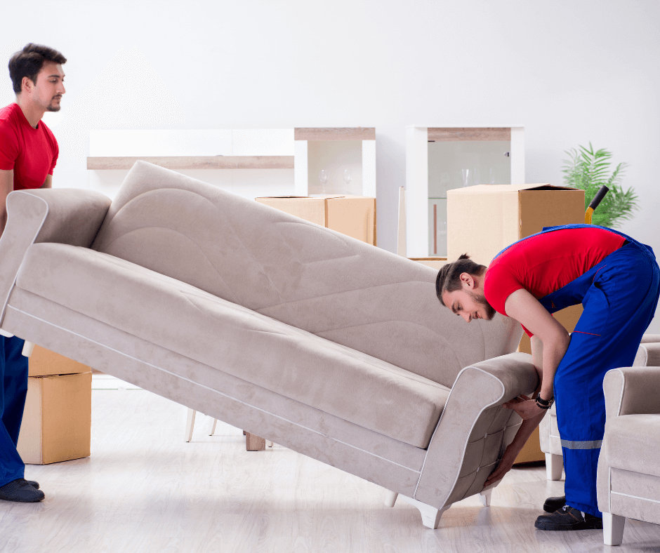 two man lift a sofa during house removals service in surbiton kt5 area